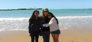 Students visit Marbella Beach in Andalusia, Spain over Spring Break 2013 on the Spanish trip. From left to right are alums of class of 2014 Emma Chang and Claire Foussard, and senior Eva Perez-Greene