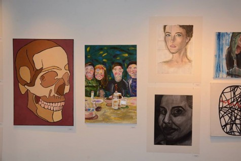 (Left to right) Painting by junior Ivan Gunther, Painting by senior Lauren Woessner, Painting by sophomore Lillian Pettigrew, Charcoal drawing by sophomore Sabrina Rucker