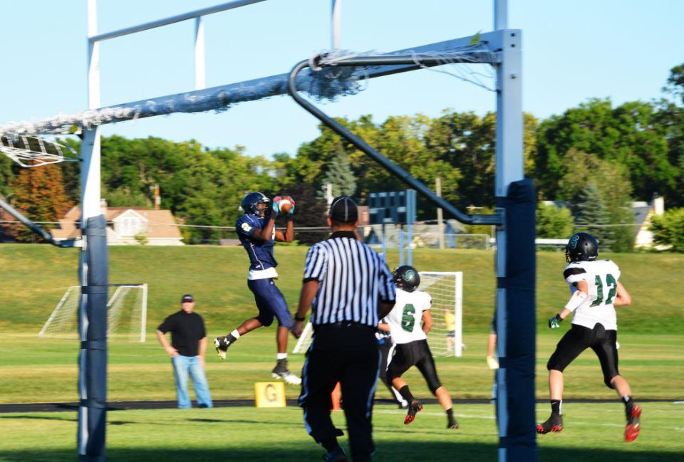 Sophomore wide reciever Dalante Peyton catches a pass from sophomore quarterback Michael OShea for a touchdown, giving the Spartans a 17-0 lead against Spectrum. 