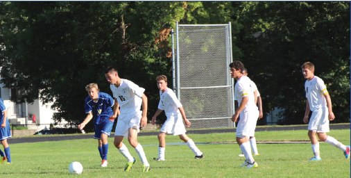 From left: Junior Sam Suzuki, freshman Drew O’Hern, junior Jordan Moradian and junior Tyler Seplak look for an open kick in their game
against Academy of Holy Angels on Sept.10. “Our goal is to really work hard playing together as a team,” junior captain Tyler Seplak said.
