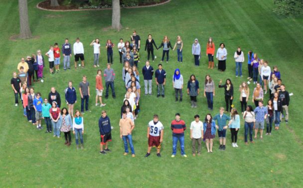 Today Upper School students created a human peace sign on the front lawn. Intercultural Club member junior Afsar Sandozi said that the activity was “good, efficient, and cooperative.”