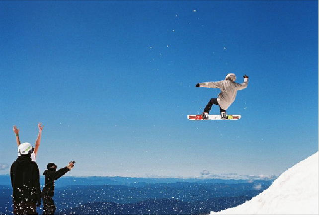 Senior Christian Koch performs a jump as onlookers cheer. “The scarier [the trick] is, the more fun it is,” his brother junior Nicolas Koch said.