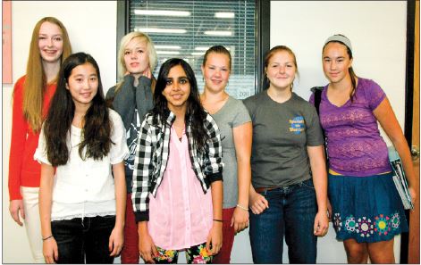 A few of the freshmen interested in bringing PAWS back pose in the 9th grade hallway for a picture. “I was so excited to support something I really cared about,” freshman Sonia Sukumar said. Back row, left to right: Elena Macomber, Emily Schoonover, Shelby Teitle, Lauren Boettcher, Sammie Bluhm. Front row, left to right: Stephanie Li, Sonia Sukumar.