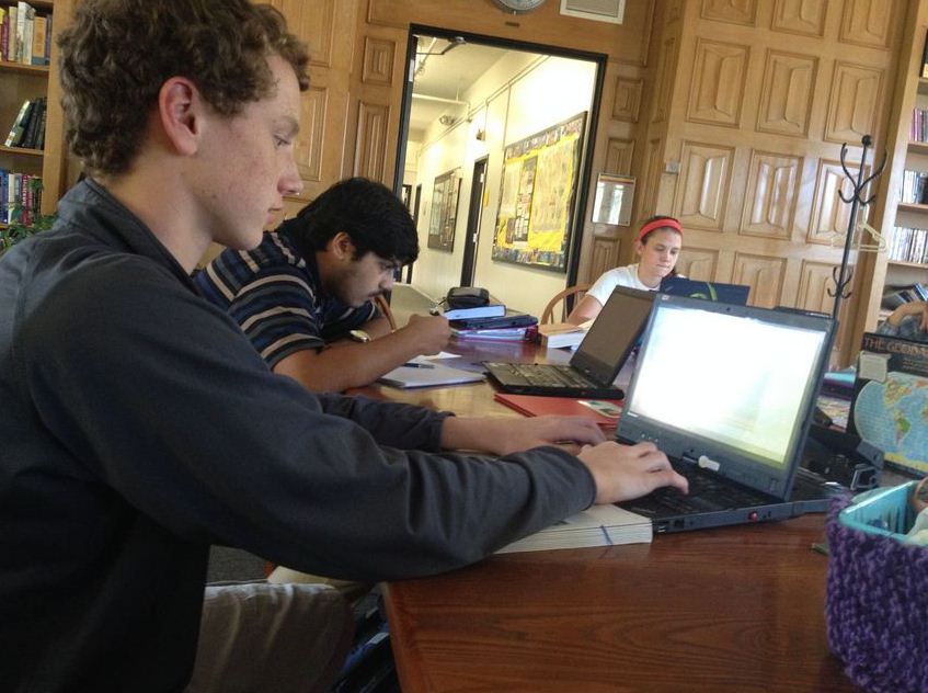 Sophomore Charlie Hooley uses Google Drive to work on a history project during tutorial. Its a better way to get work done with a group, Hooley said. 