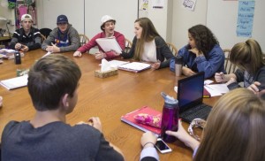 From left to right, Student Activities Committee seniors Cal Nicholson, Noah Parker, Mick Sullivan, Claire Foussard, Jonte Claiborne, and Chloe White sit as co-presidents Sullivan and Foussard discuss upcoming plans.