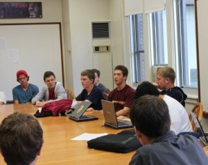 From left: Senior Dylan White, junior Bill Naas, junior Halsey Moe, senior president Nick Cohen, and senior Nick Hoffmann engage in one of SPU’s weekly discussions, “I like being able to hear the different viewpoints of people who aren’t in the majority of the rest of the school,” Cohen said.
