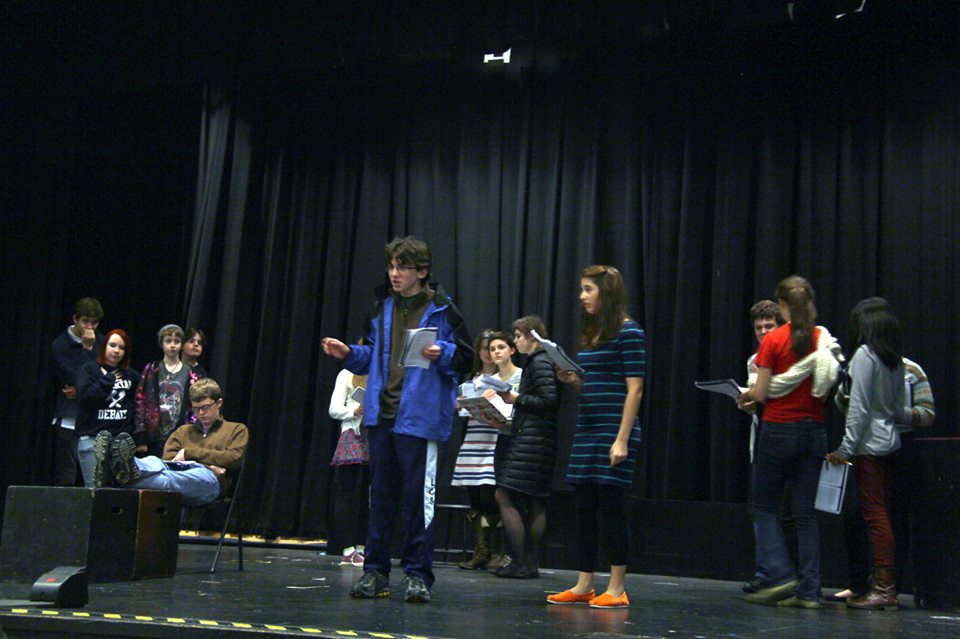 The cast of the Caucasian Chalk Circle rehearses in the Sarah Converse Auditorium. 