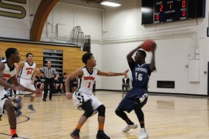Sophomore Dalante Peyton, right, plays during a game against Humboldt High School on Nov. 26. “This year will be a different story,