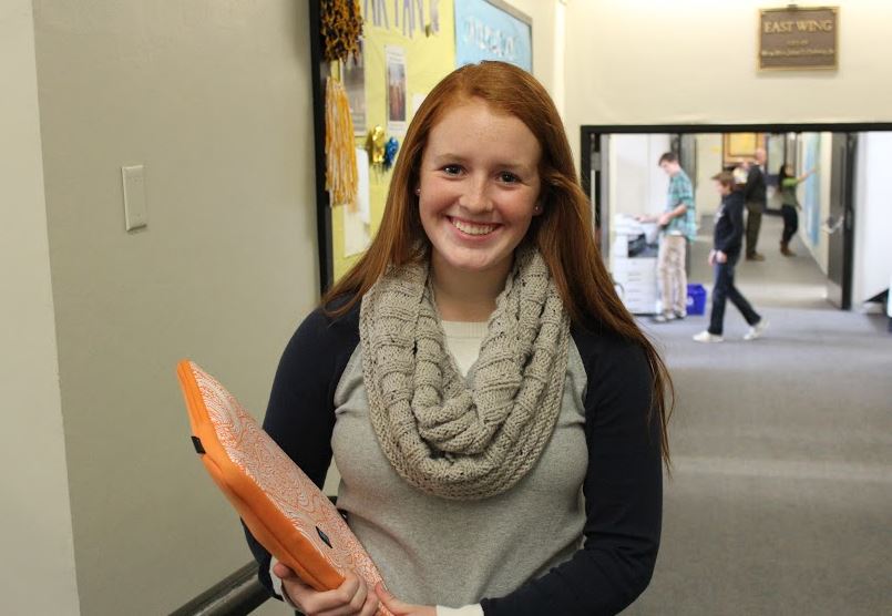 Freshman Macy Blanchard wears a gray infinity scarf.