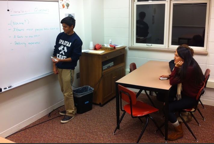 Seniors Jared Mosher, Ellis Evans, and Emma Chang prepare for the Student Diversity Leadership Conference. “The honesty you see from people—it’s just amazing! Kids just break down and tell their deepest darkest secrets,” Mosher said.