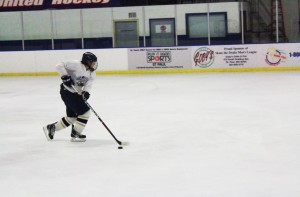 Sophomore Evan Dahlseide practices during a drill at a captains' practice in Drake Arena on Nov. 4. Team manager senior Claire Foussard said, “This year is going to be one of the strongest years in a while” due to the team’s newest members.
