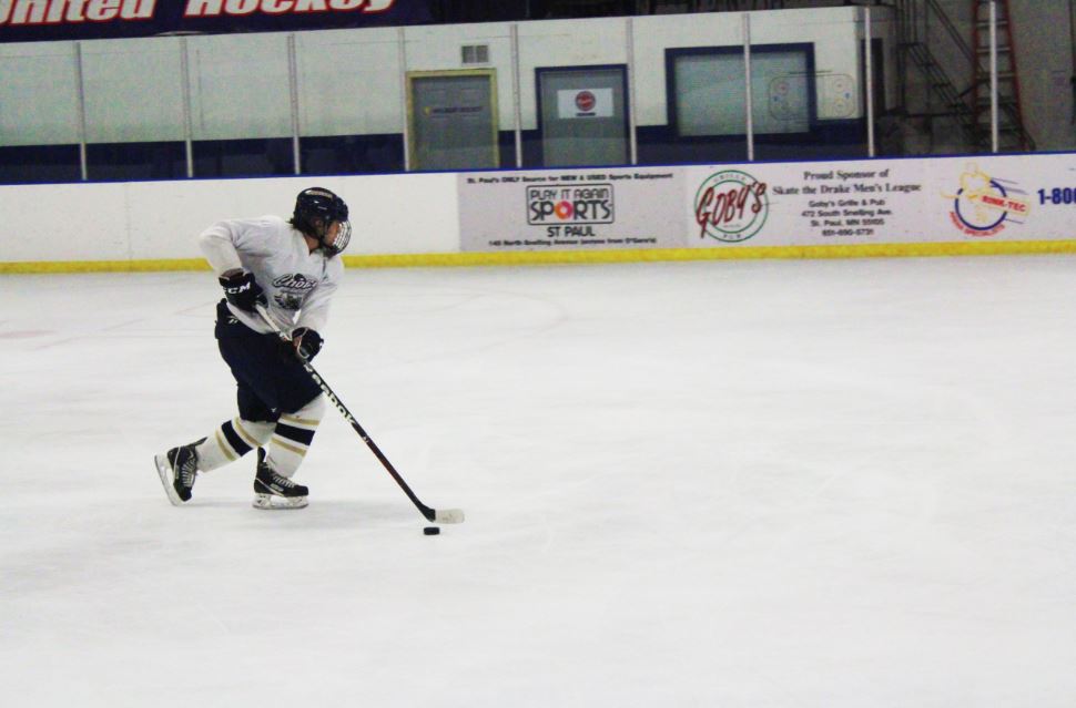 Sophomore Evan Dahlseide practices during a drill at a captains practice in Drake Arena on Nov. 4. Team manager senior Claire Foussard said, “This year is going to be one of the strongest years in a while” due to the team’s newest members.