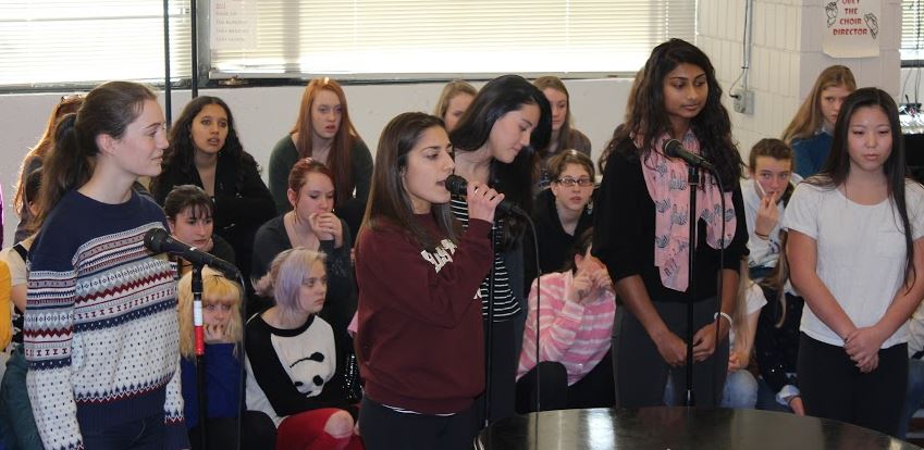 Senior Women practice "We are young" by Fun. From left to right are Charlotte Hughes, Meera Singh, Emma Chang, Sonya Das, and Helen Derechin. 