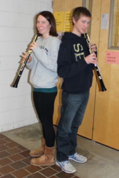 Patterson cousins, senior Sela Patterson and junior Kevin Patterson pose with their oboes after rehearsal. When considering the challenges of the instrument, Kevin said, “the hardest thing is that it is sometimes a little difficult to produce a good sound that is in tune.”