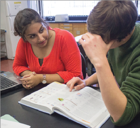 Sophomore Milo Wittenberg meets with Junior Tutor Afsar Sandozi. “I know that [the tutors] are there but I don’t really see them.” freshman Kyle Ziemer said. 