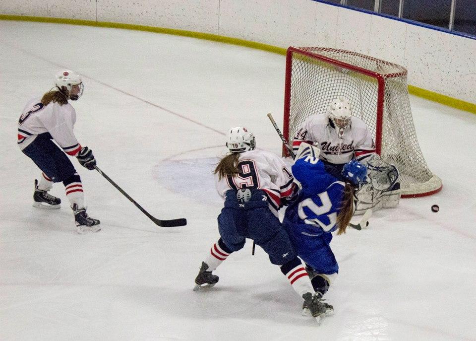 Sophomore goalie Catherine Johnson blocks a shot during a game against Holy Angels Academy and Richfield High School on Dec. 3. "The coaching staff is completely new, so I think that’s helped us,” Johnson said. 