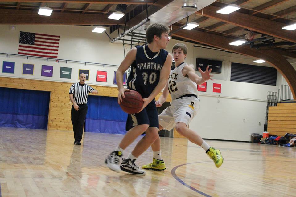 Sophomore Michael OShea tries to get the ball past a member of the opposing team. 