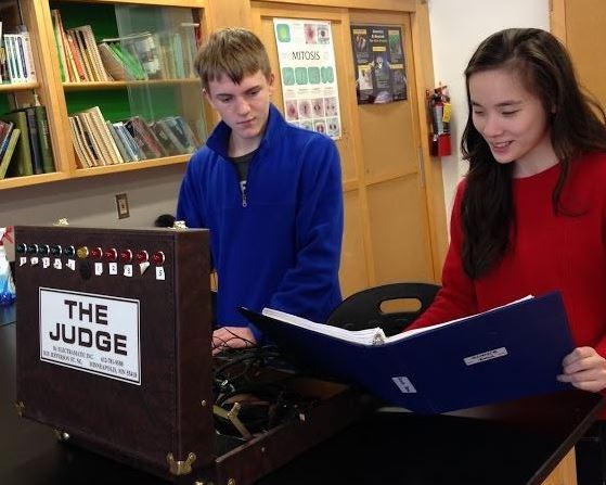 Science Alliance members junior Brian Heilig and senior Cynthia Zheng practice for the upcoming Science Bowl competition. “This year we are hoping to build a larger team so we can compete in every event for Science Olympiad and have a strong Science Bowl team,” Zheng said.