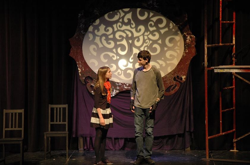 Romans’ and Biggs’ characters talk, while shadow puppets directed by sophomore Netta Kaplan play on the screen behind them. 