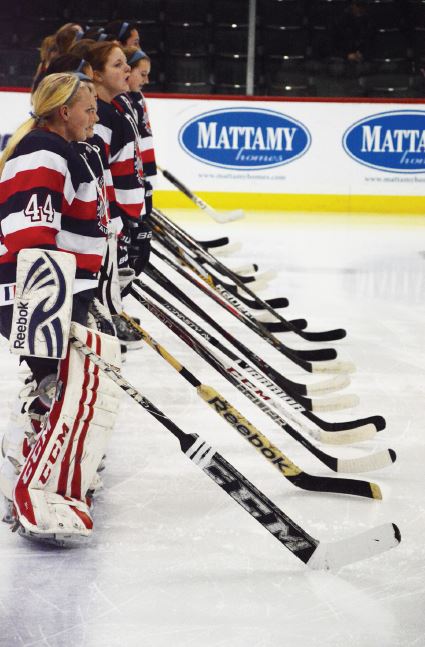 The United Hockey team, with sophomore goalie Catherine Johnson at the front, lines up to head into the semifinals of the Feb. 21 state tournament. 