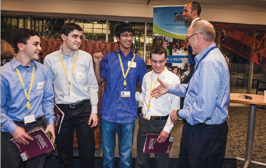 Academic Worldquest team members freshman Raffi Toghramadjian and juniors Thomas Toghramadjian, Shaan Bijwadia, and Jack Labovitz are congratulated for their performance at Minnesota’s Academic Worldquest competition.  “I looked at Shaan and both of us totally thought we did awful, and then they announced that we won,” Labovitz said.