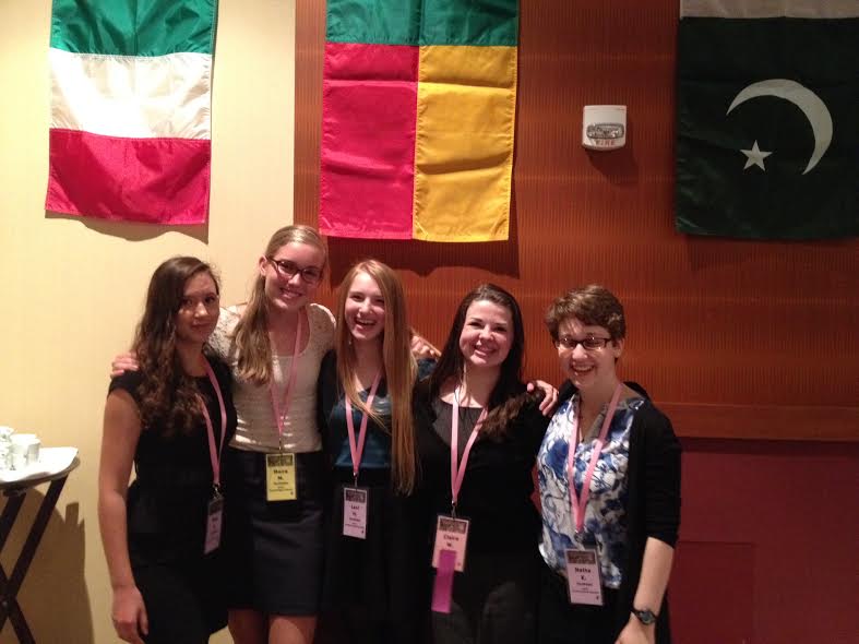 Model United Nations participants sophomore Nina Zietlow, freshman Moira McCarthy, sophomore Lexi Hilton, sophomore Claire Walsh, and sophomore Netta Kaplan represent the country of Benin at the conference held on Mar. 27-29 at the Minneapolis Marriott City Center.