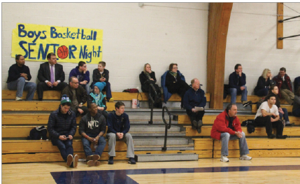 Only a handful loyal Spartan student fans attend the home Girls Varsity Basketball game against Breck on Feb 26. The team lost 50-43.