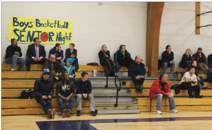 Only a handful loyal Spartan student fans attend the home Girls Varsity Basketball game against Breck on Feb 26. The team lost 50-43. 