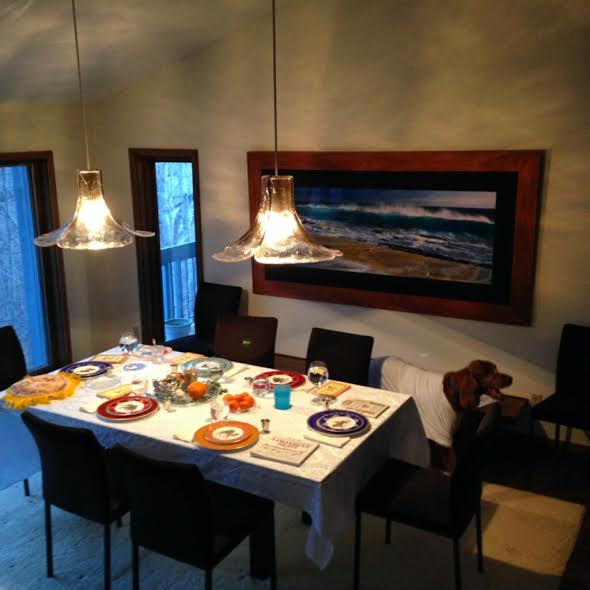 Senior Sharon Sethna and her family has prepared their Seder table for Passover. “I always make [matzah] pizzas; that is what I live off of during Passover,” Sethna said. 