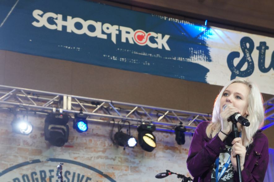 Freshman Emily Schoonover performs in the music program School of Rock. She competed in a national competition for a part in the program's All Stars Tour. “I think about 24,000 people from across America tried out," she said.