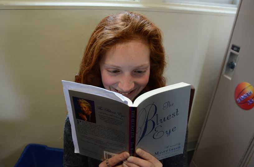 Senior Grace Owens-Kurtz reads The Bluest Eye, a book by Toni Morrison for her Gender and Literature English class. “Watching a movie just isn’t the same as reading a book,” she said.