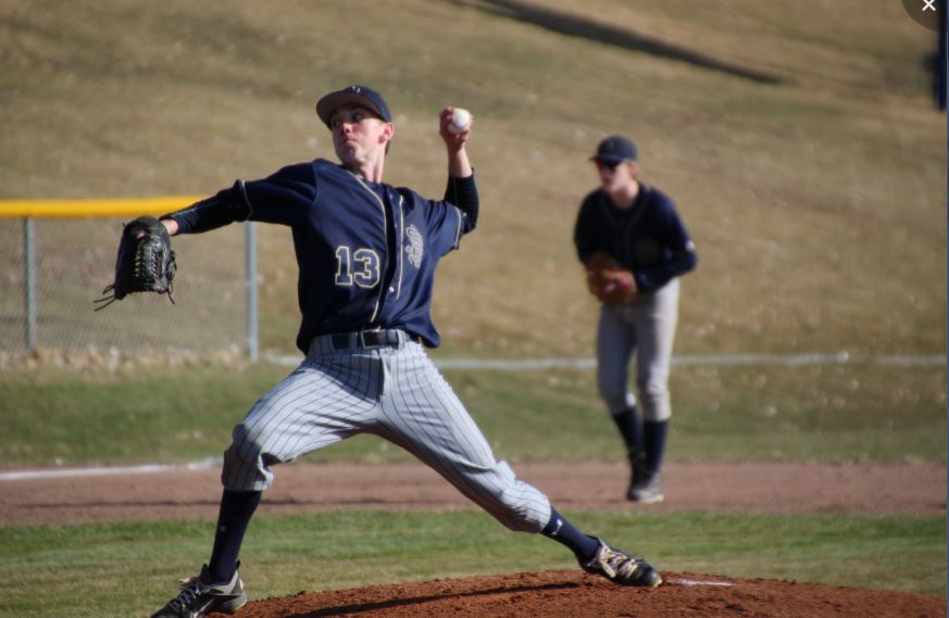 Senior captain Josh Johnson throws a pitch in a home game against St. Paul Johnson. We have nine less guys as in the program compared to last year, which makes it difficult to make complete rosters for both teams. Junior Luke Bishop said. Despite these losses, the SPA team won the game with a promising 10-0 victory. 