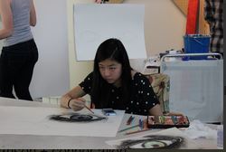 Senior Jessica Wen works during her senior art seminar class. 