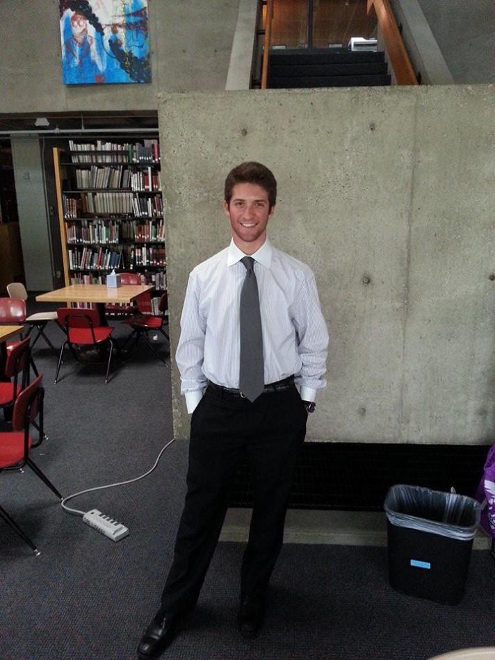 Senior Nick Cohen passes through the lower library after a day at the office of First Assistant Public Defender Andrew Mohring. "“[My project] really opened my eyes more to criminal public defense. It’s a really tough job,” Cohen said. 