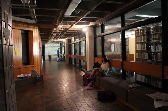 Students looked for corners of light during their free period at the end of the day on May 27, when a power outage left the building in the dark.