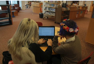 Sophomore Phoebe Pannier works with sophomore Emily Schoonover on an assignment via Google Drive. “It’s helpful to be able to collaborate with peers on group projects,” she said.