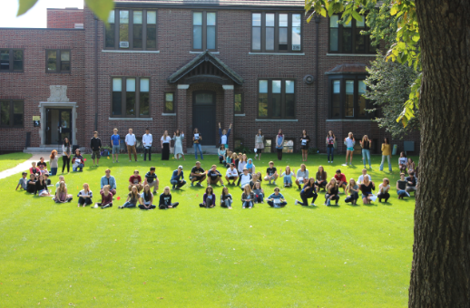 Students for Social Justice, Intercultural Club, and Poetry Aloud planned an all-student event to recognize the International Day of Peace.  Upper School students on the Randolph Campus assembled on the front lawn Sept. 22 to form a human peace sign for the second year in a row. Senior Bella Martinez read “No Flowers for Terrorists,” by Linda Lerner. Dozens of students joined to honor and observe this day of global peace. “I had fun reading the poem,” Martinez said, “because it felt significant.”