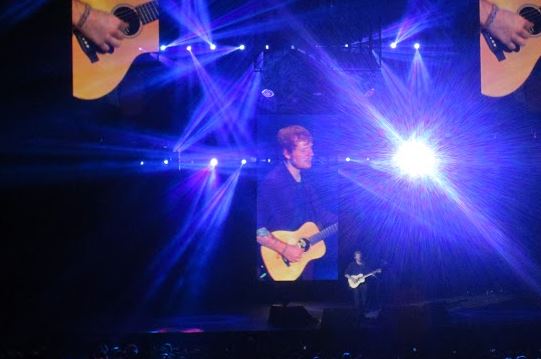 Ed Sheeran performs at the Target Center in Minneapolis on Sept. 15.  "Let's go back to thuh dinjay tymes when things were more simple, ehh?" Sheeran asked the crowd, in his charming British accent.  Sheeran entertained the crowd with little more than his guitar and microphone.