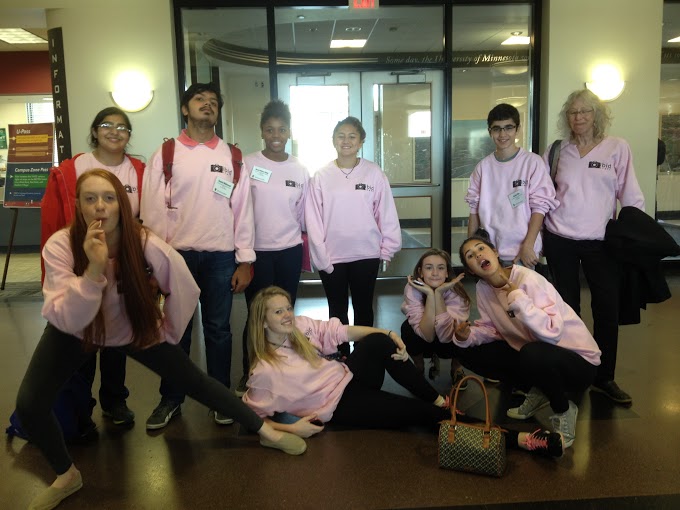 Members of the 2014-2015 Ibid staff pose for a photo at the Minnesota State High School Press Association Minnesota State Journalism Convention on Oct. 7. “[The best part is] seeing people like the yearbooks and the final product and knowing that they’ll still have this book in 50 years,” co-editor-in-chief senior Kennedy Strombeck said. From left to right: senior Kennedy Strombeck, junior Madeeha Rizvi and Danish Mahmood, freshman Olivia Williams Ridge, senior Nancy Moyers, junior Claudia Rosario, senior Carrie Jaeger, senior Bella Martinez, freshman Daniel Ellis, and Ibid adviser Linda Brooks.
