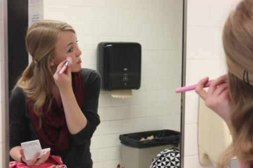 JUNIOR MIRIAM TIBBETTS demonstrates her own makeup technique. “Try doing makeup for a show sometime because you get a lot of credit for what you do and [it] is completely necessary for the show. Just remember to have fun,” Tibbetts said.