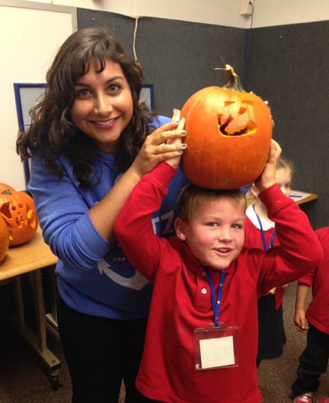 Senior Afsar Sandozi poses with her partner and pumpkin.