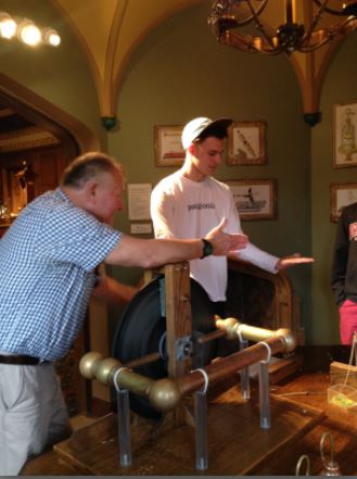 Junior Karsten Runquist experiments with electricity at the Bakken Museum.