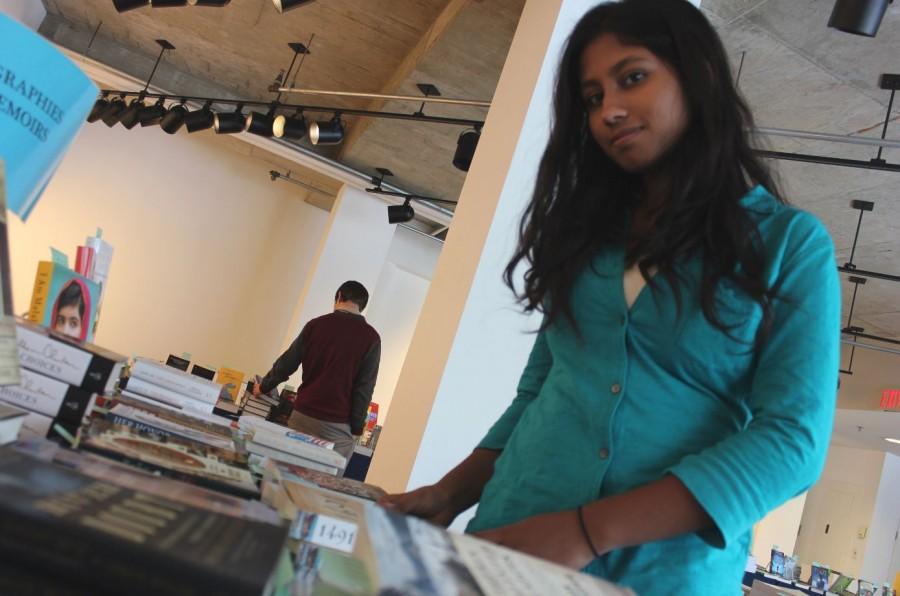 Junior Navodhya Samarakoon browses at Bookfest to find some of the books she has on her list of must reads. “There are a few books I really want to read at Bookfest. I Am Malala [by Malala Yousafzai ]and 1491 [by Charles C. Mann], mainly,” Samarakoon said.