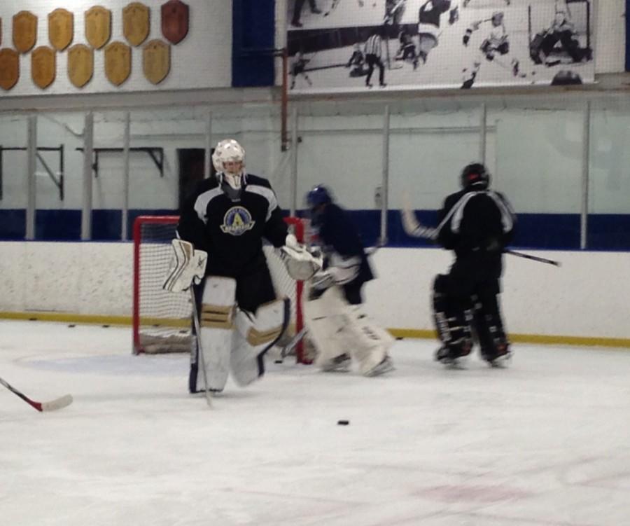 junior goaltender david nicholson practices at Drake Arena on Dec 8.  “I am perfectly okay with  practice over winter break and in fact, I really like it,” Nicholson said. 