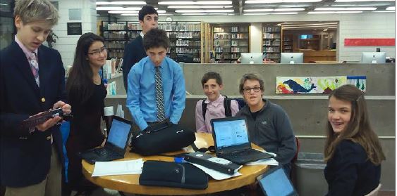 novice debaters PREP for the State Tournament, in the Upper Library just before leaving for the competition on Dec. 5. “It was a lot of fun, there were a lot of people there and there was a larger range of competition … there were definitely higher stakes,” freshman Henry Zietlow said. 