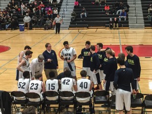 The team meets during half time. “It’s good to beat a good team. Central made it to state last year and they are a good team. We’ve also had a bunch of close losses, so it is also good to get back winning," junior Kent Hanson said.