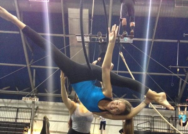 Freshman Marlo Graham practices on the hoops. Graham has been in Circus Juventas for over nine years and will be performing in the Summer Show. "It does hurt, but it is all worth it because it is what I love and my passion," Graham said.