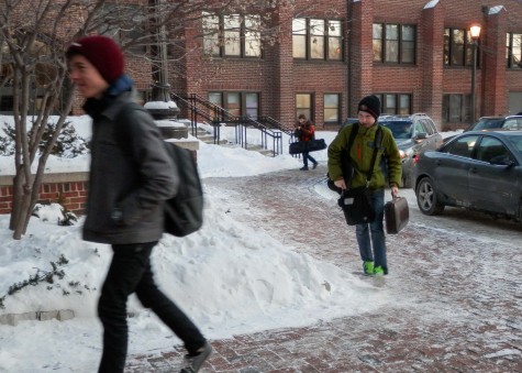 Students arrive to school in warm winter coats and hats in order to protect themselves from unforgiving temperatures.