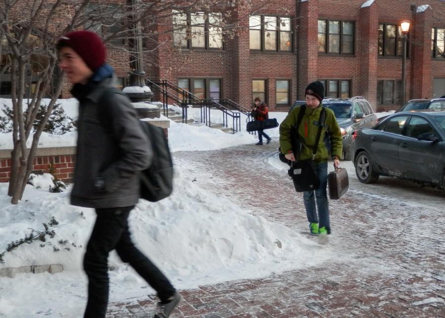 Students+arrive+to+school+in+warm+winter+coats+and+hats+in+order+to+protect+themselves+from+unforgiving+temperatures.