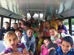 Camp Streefland campers and counselors riding the bus.